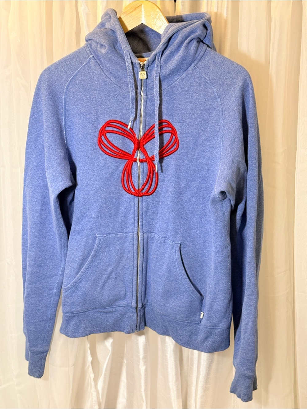 TNA Blue Zip-Up Hoodie with Red Rope Graphic
